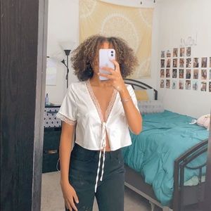 Silky tie top with lace trimmings